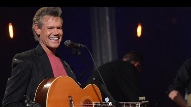 'RANDY TRAVIS IN CRITICAL CONDITION'