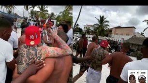 '6ix9ine passes out $100 bills to kids & gets swarmed by fans!'