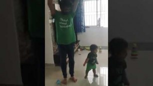 'Baby teaches exercises to dad funny'