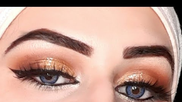 'Brown and gold eyes makeup // using bad habit after dark pallete'