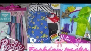 'Barbie Fashion Packs Roxy, Wonder Woman, Chelsea Raincoat'