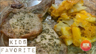 'Ranch baked pork chops with cheese potatoes. Super easy dinner that is always a hit!'